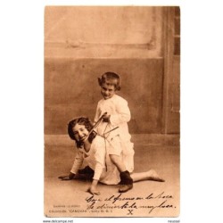 Tarjeta postal de circulada con pareja de niños jugando con cuerdas