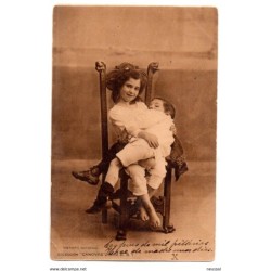 Tarjeta postal de circulada con pareja de niños instinto maternal